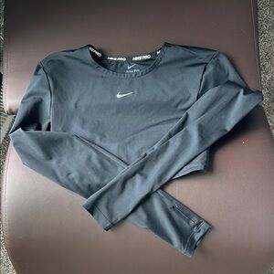 Nike Women's Black Long Sleeve cropped open back Top